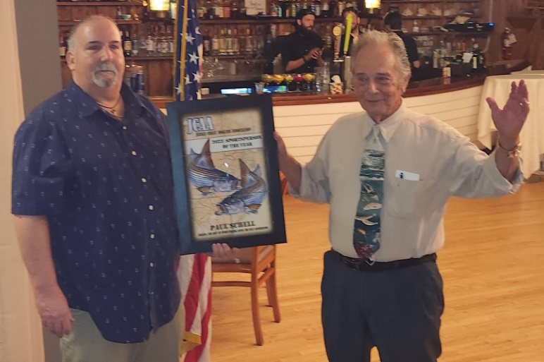 President Mark Taylor presenting the Sportsperson of the Year Award to Paul Schell
