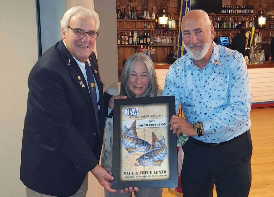 JCAA VP and Youth Education Chairman Don Marantz presenting the Youth Education Award to Paul and Joyce Lenzo